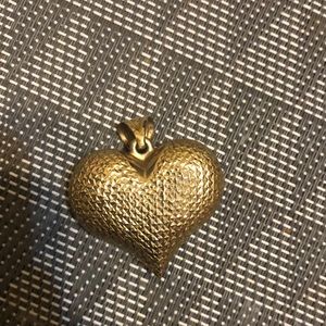 Very unique two sided gold and white gold pendant